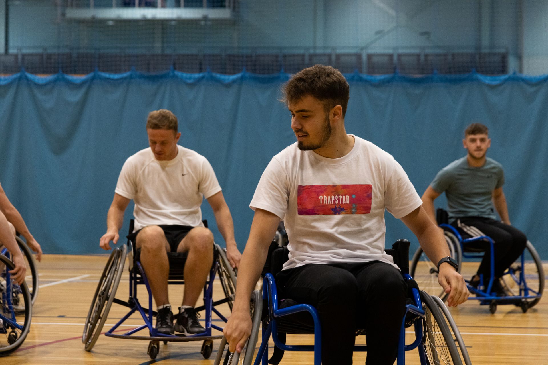A team playing wheelchair basketball